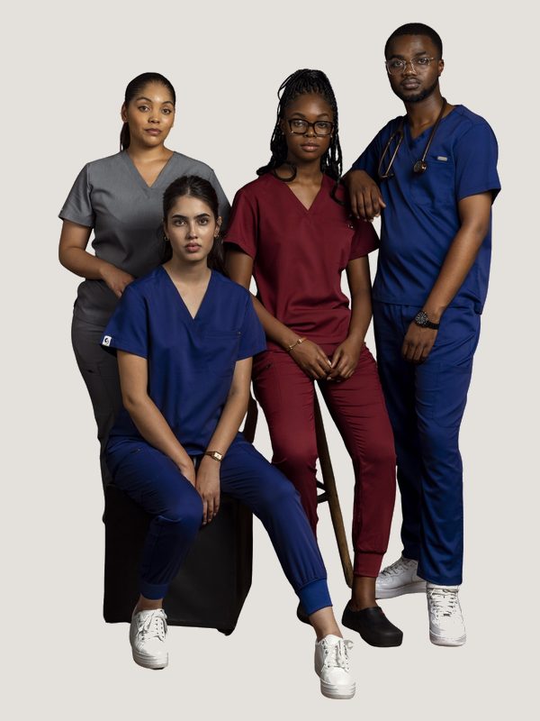 Four healthcare workers in Solo Essentials scrub sets